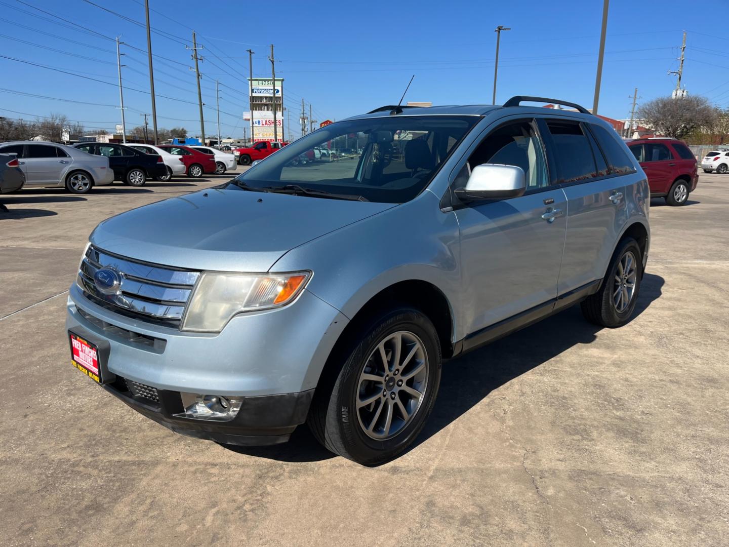 2008 blue /black Ford Edge SEL FWD (2FMDK38C98B) with an 3.5L V6 DOHC 24V engine, 6-Speed Automatic Overdrive transmission, located at 14700 Tomball Parkway 249, Houston, TX, 77086, (281) 444-2200, 29.928619, -95.504074 - Photo#2